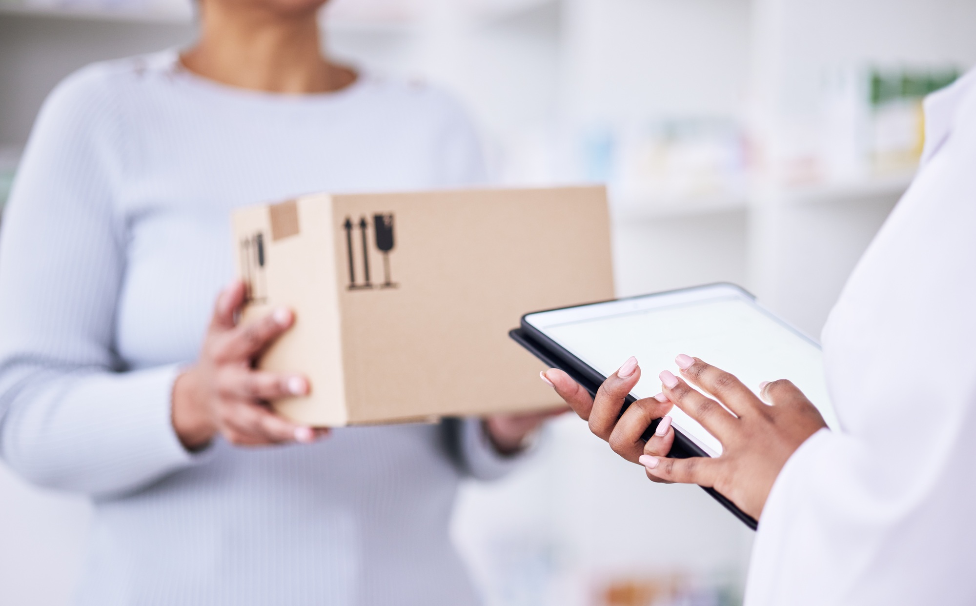 Woman, pharmacist and tablet with box for delivery order, supply chain or logistics at pharmacy. Ha